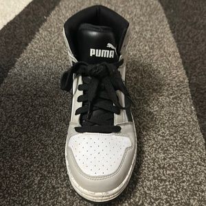 Grey white and black Puma